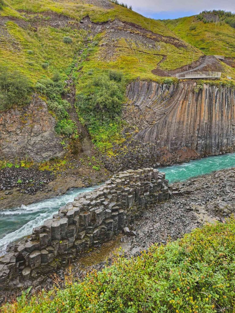 Studlagil canyon basalt column island